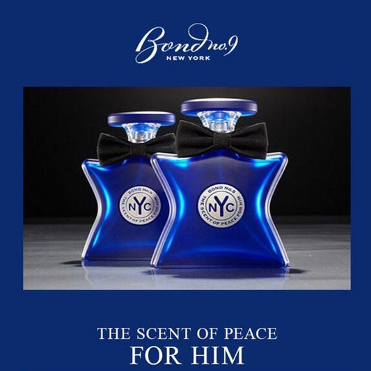Two blue perfume bottles with black bows on a dark background, featuring the Bond No. 9 New York logo.